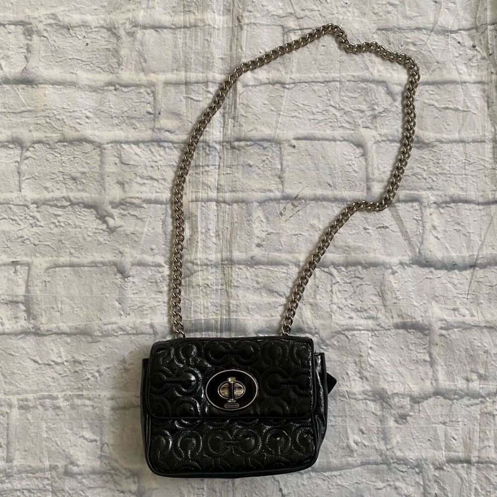 Coach mini shoulder/crossbody bag w/twist latch closure w/satin inner lining